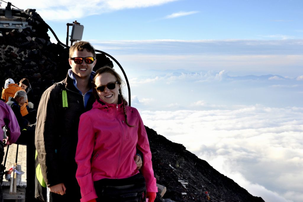 Emily of EmmiClaire Photography and her husband on top of Mt. Fuji in 2013.
