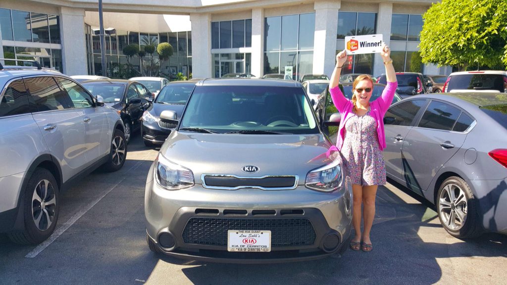 Emily and her brand new car from The Price Is RIght!