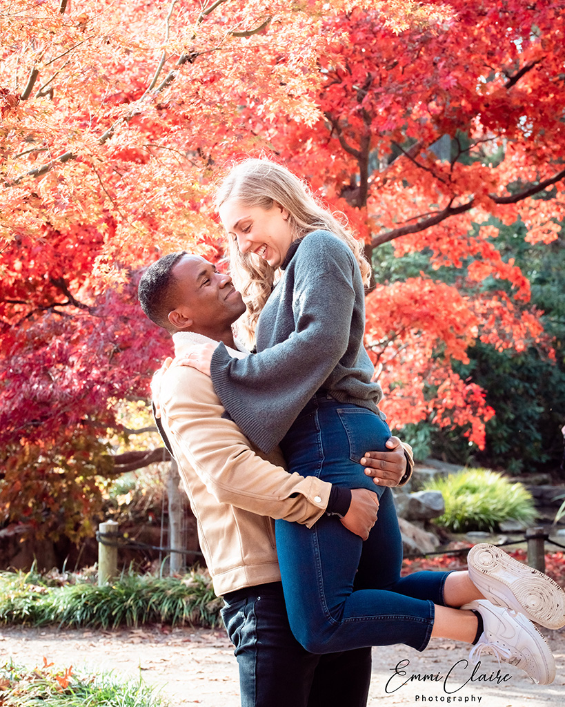 woman has jumped into the arms of her new fiance after he has proposed to capture one of the must-have images for their engagement session
