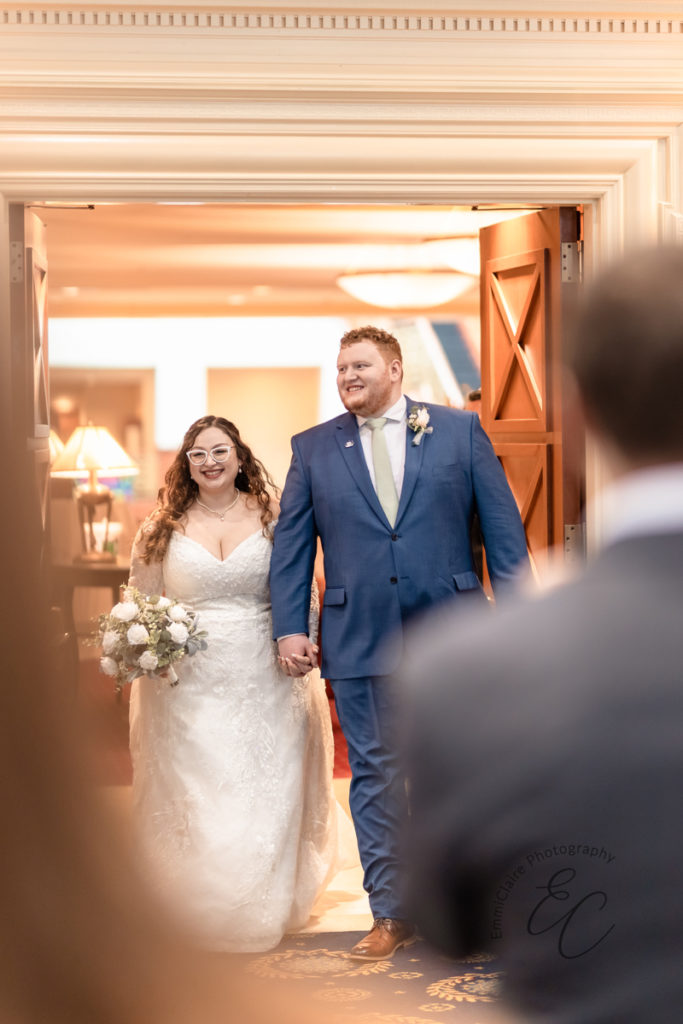 The new Mr. and Mrs. Rose make their grand entrance into their reception space!