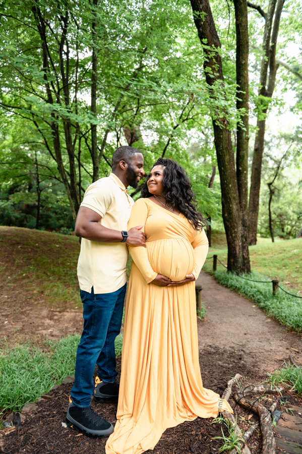 Shana and Chris gaze lovingly at one another during their maternity session.