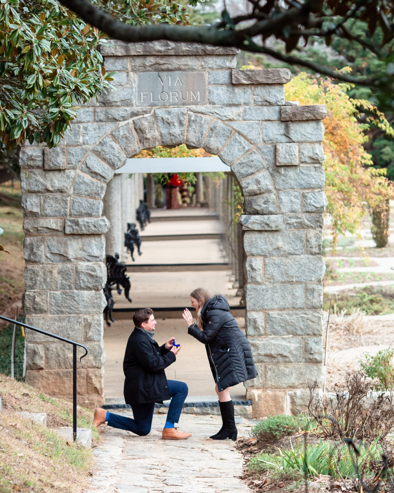 The couple's candid reactions during the surprise proposal, captured by EmmiClaire Photography
