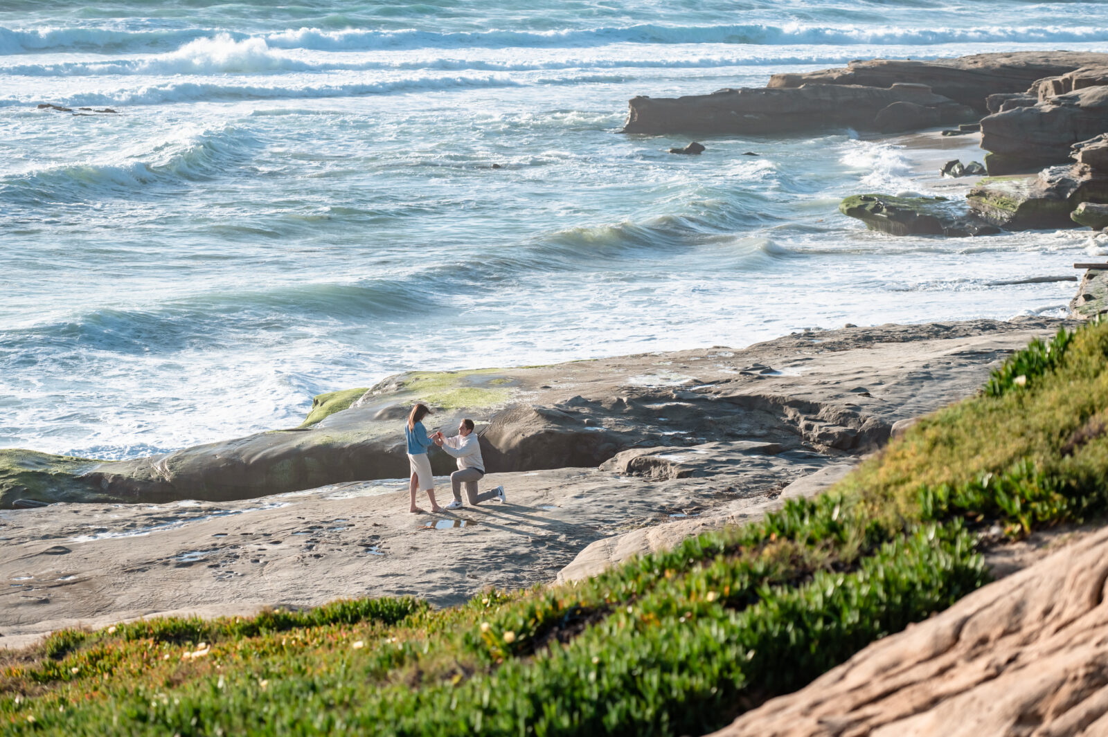 A surprise proposal captured by EmmiClaire Photography in La Jolla, California