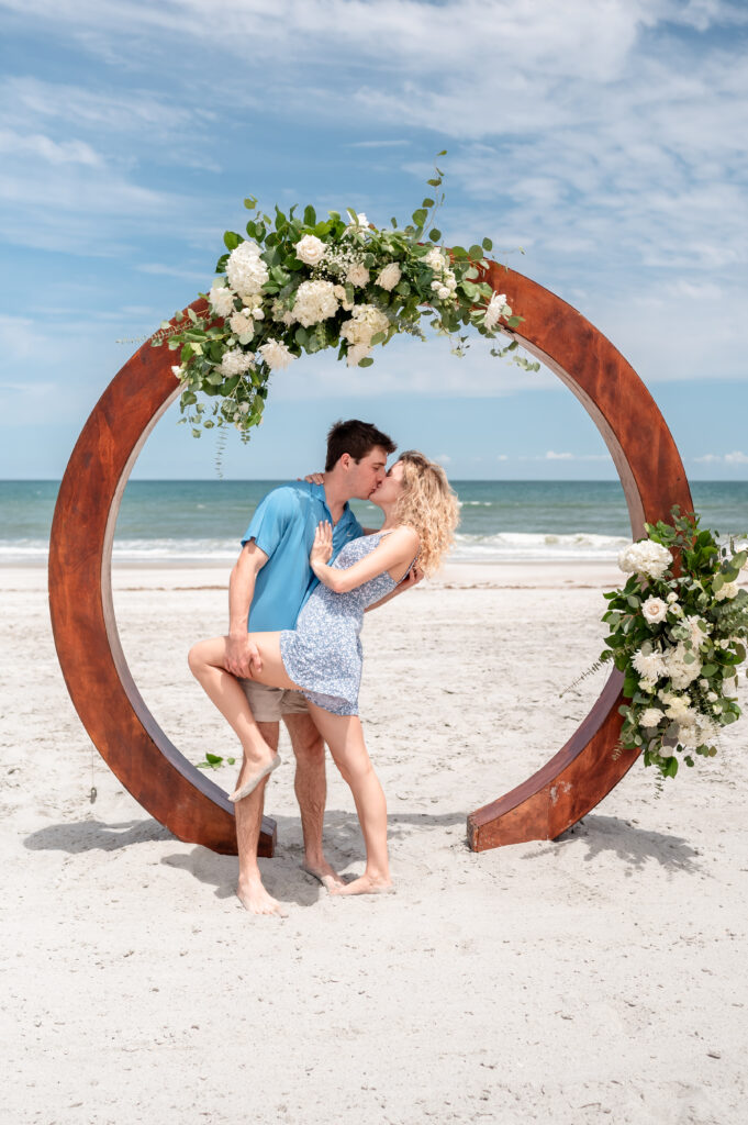 kissing under arch