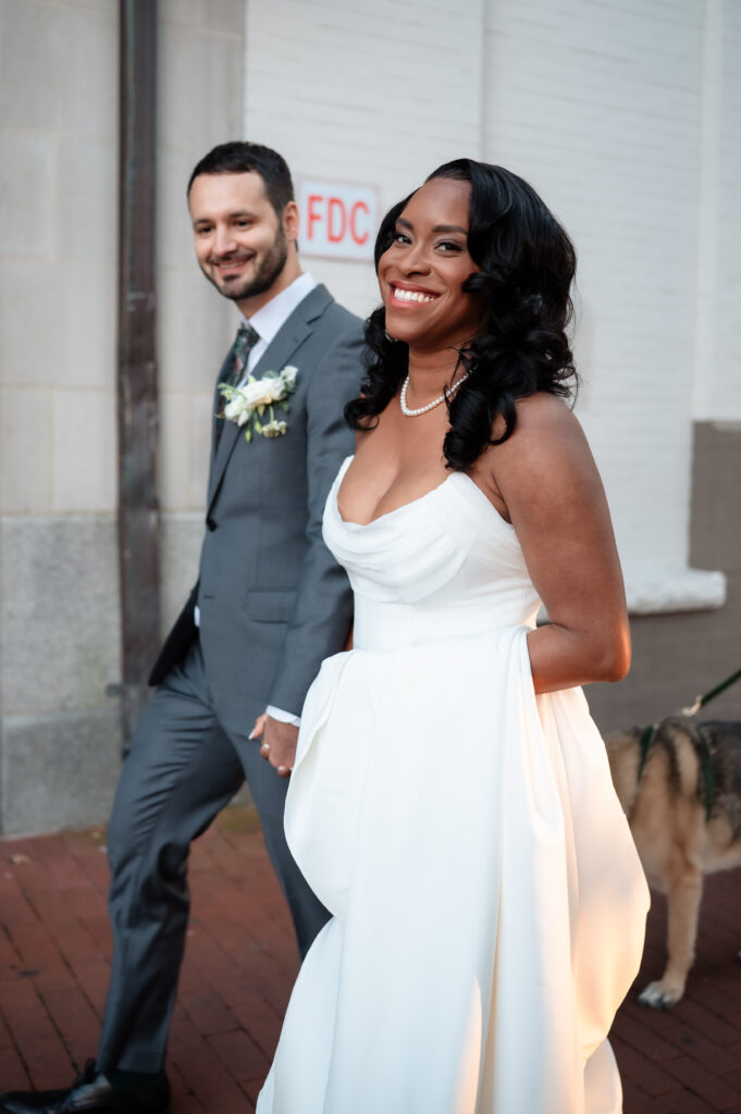 Savonia and Josh walking Washington DC to their elegant wedding 