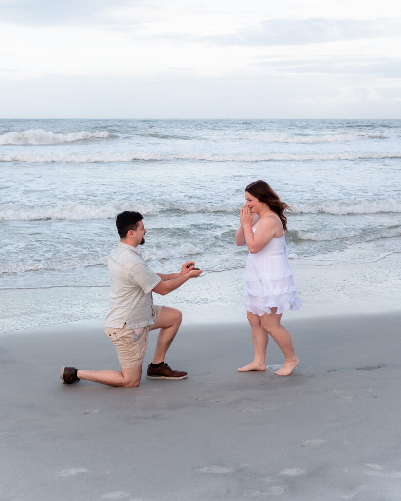 Candid reaction of Emily surprised and emotional during the proposal