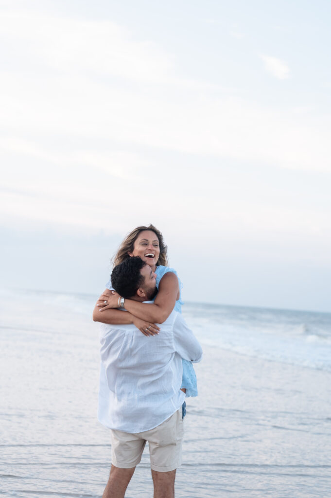 Pooja reacting joyfully during Sahil’s Ponte Vedra Beach proposal photography.