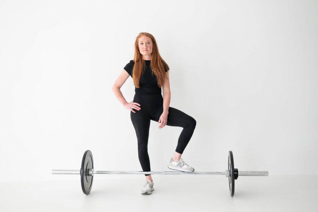 Female trainer studio portrait for Jeff’s Gym branding photos