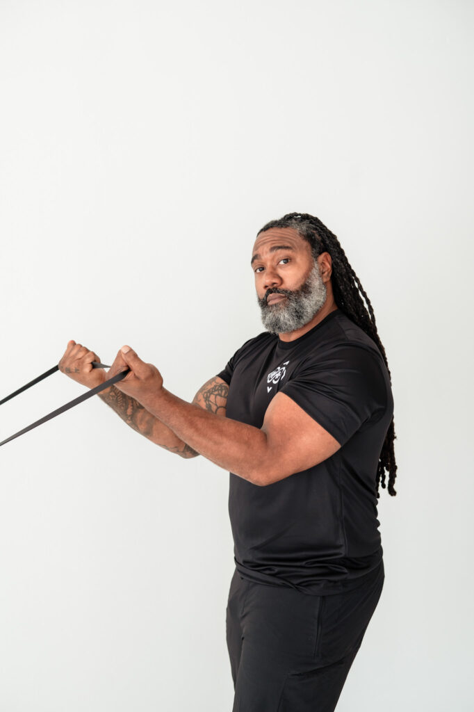 Fitness trainer working out during branding photo session Jacksonville