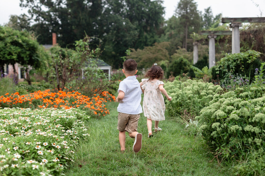 Children running through garden during Virginia family photographer session
