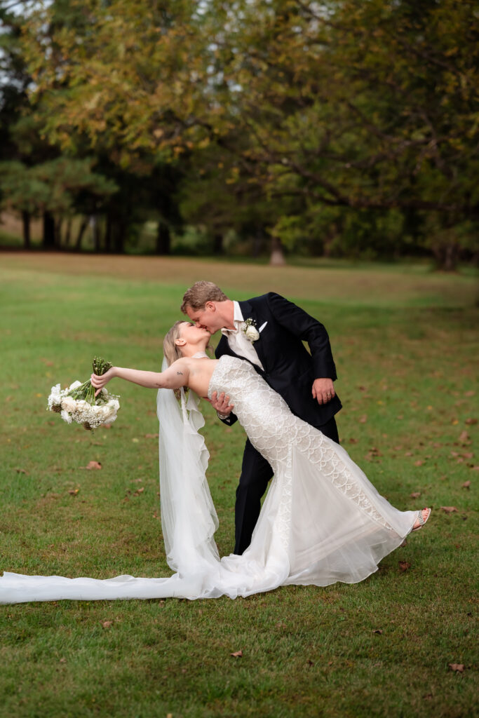 charlottesville-backyard-wedding-groom-kissing-bride