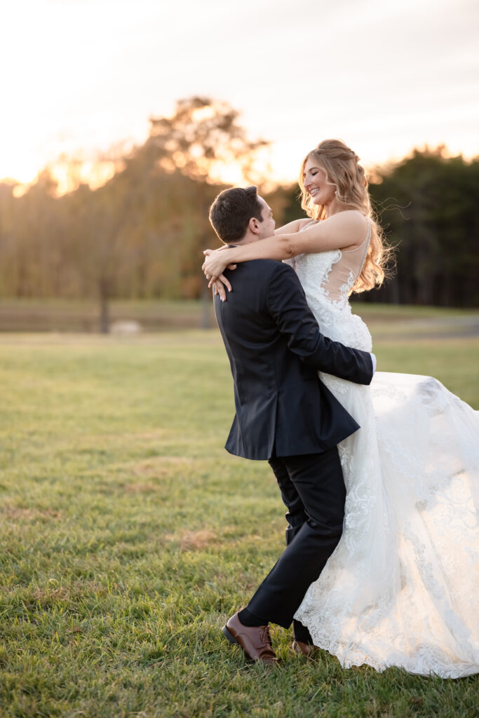 Romantic couple portraits with the bride spinning in her dress during golden fall light