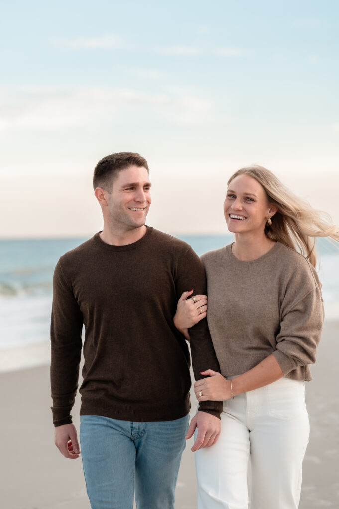 Sunset engagement photos of Rachel and Chase at Jacksonville Beach.