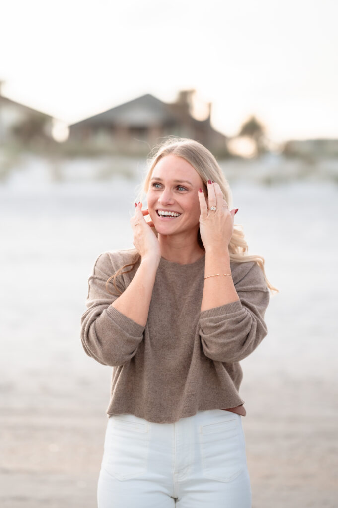 Rachel showing off her engagement ring after the surprise proposal at Jacksonville Beach.