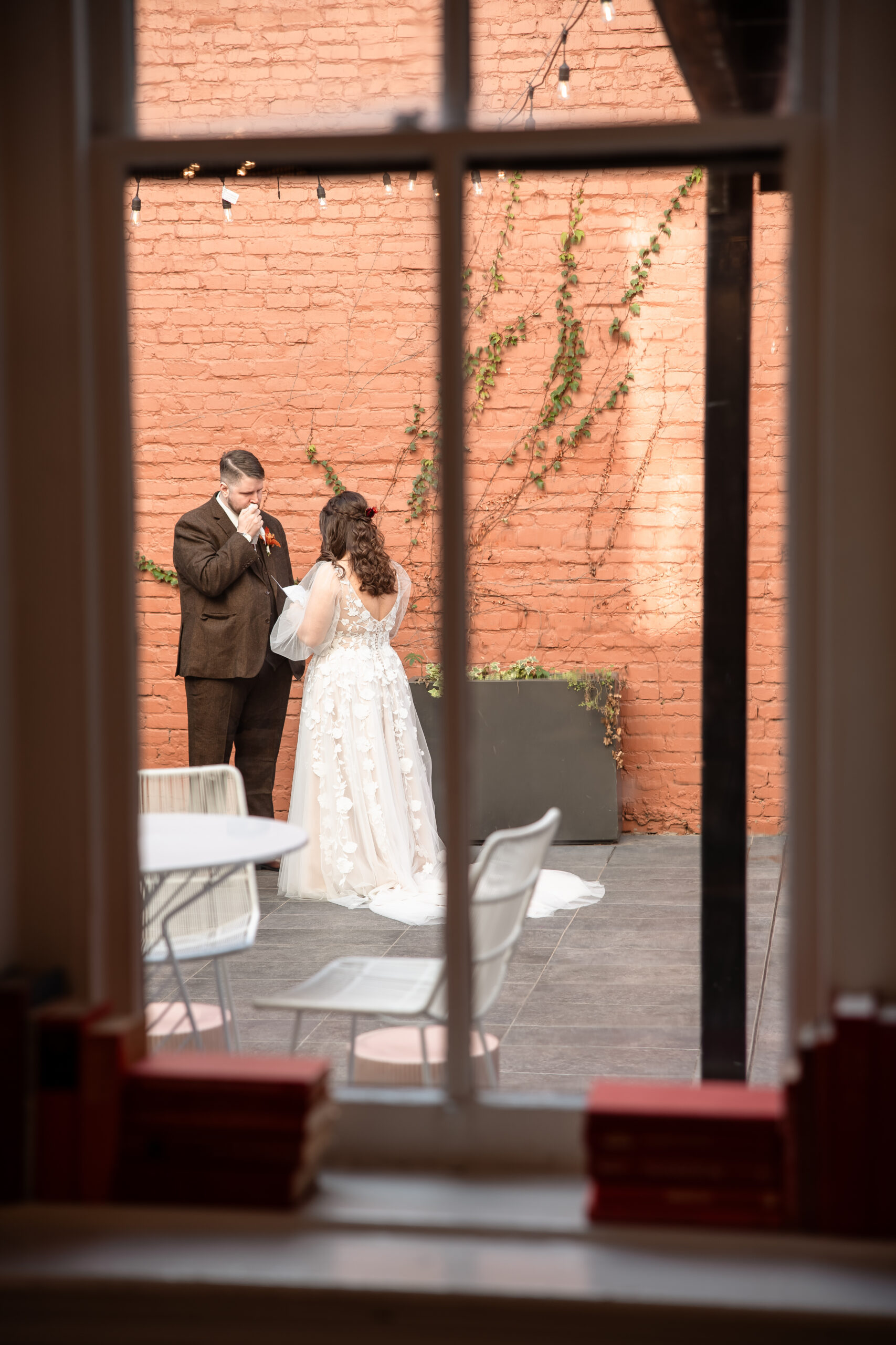 Emotional first look between a bride and groom.