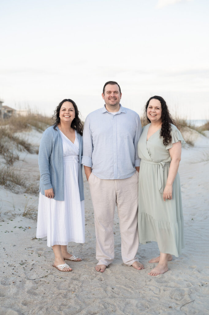 siblings portrait wooden boardwalk beach access