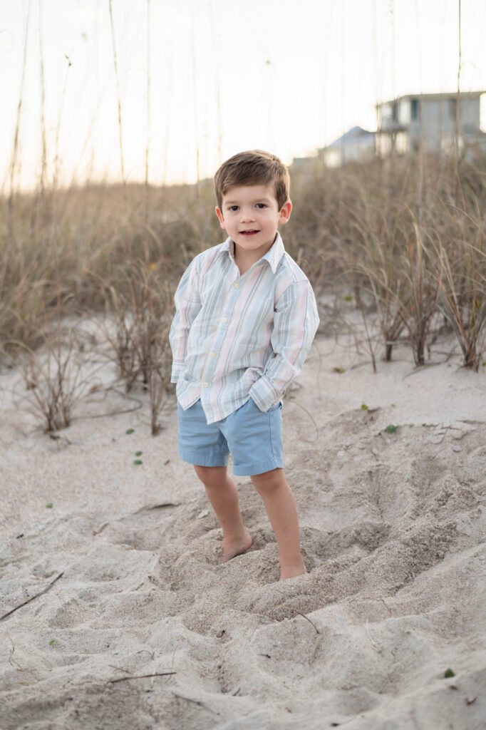 kids laughing running ocean edge candid