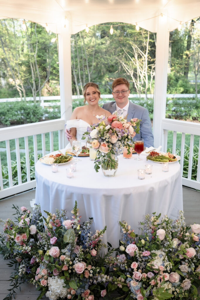 floral sweetheart table at Virginia Cliffe Inn reception