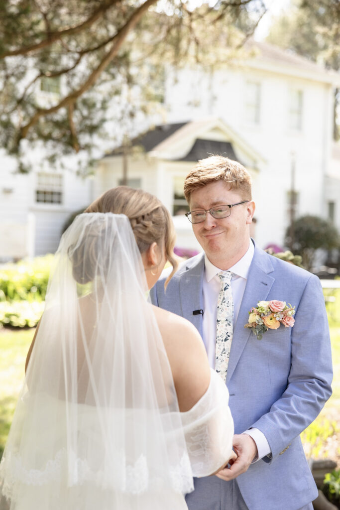 emotional first look at Virginia Cliffe Inn wedding in Richmond