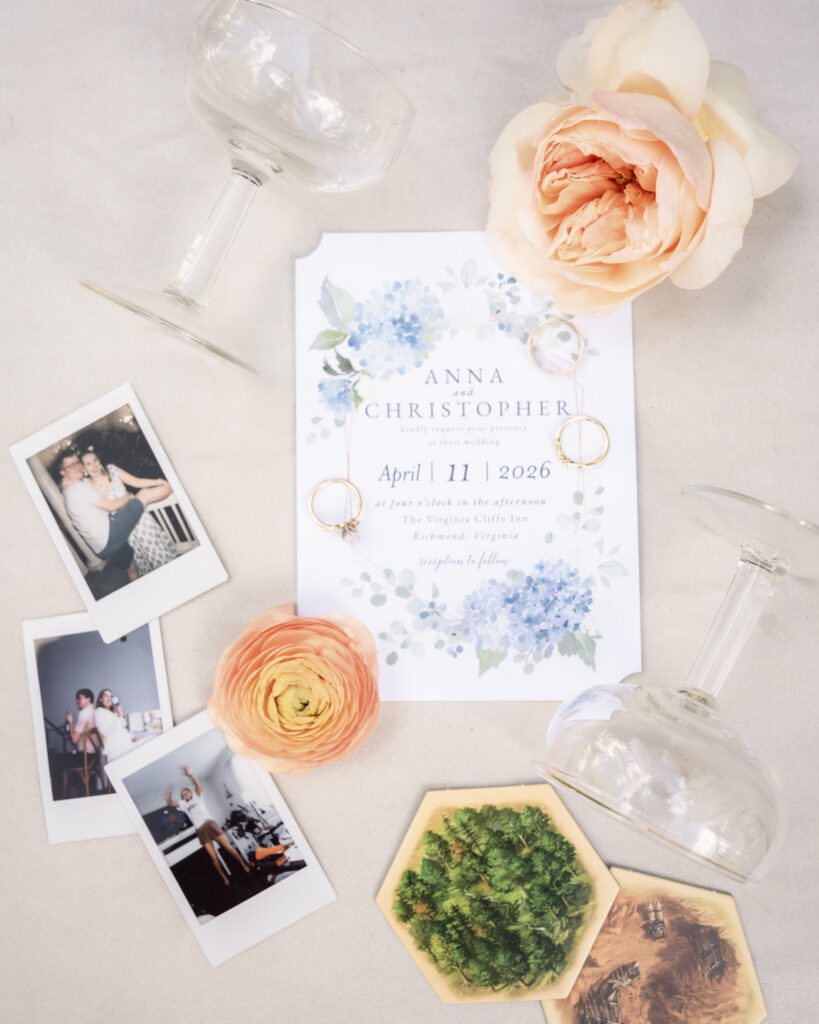 Virginia Cliffe Inn wedding invitation flat lay with spring wedding details
