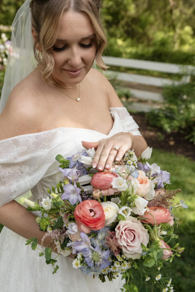 bride holding spring pastel wedding bouquet in Richmond Virginia