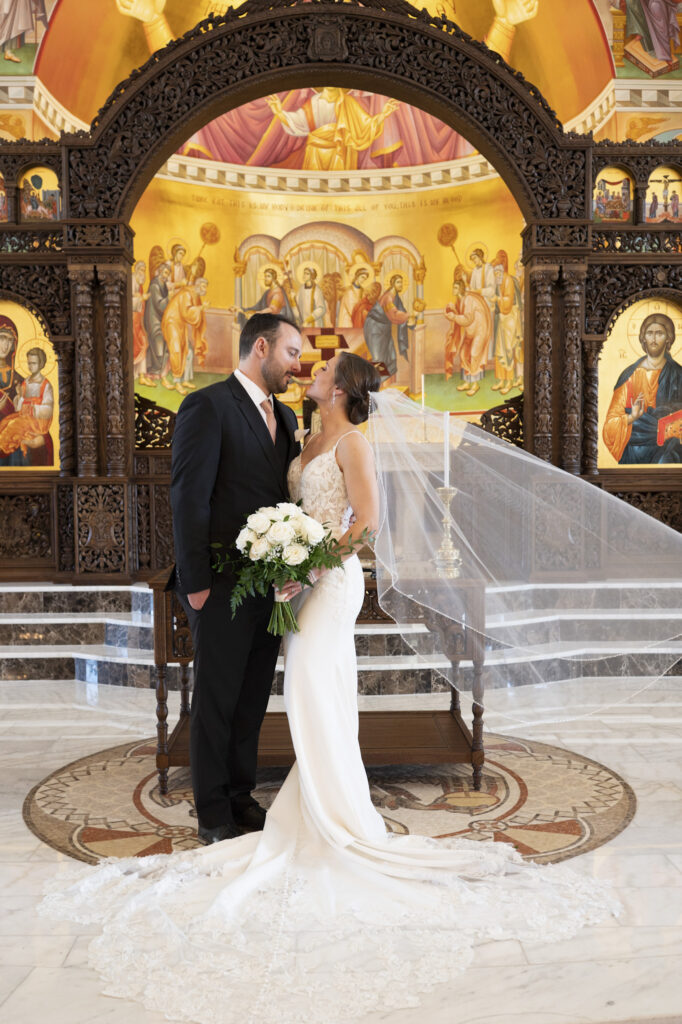 bride and groom ceremony moment at St John the Divine Jacksonville