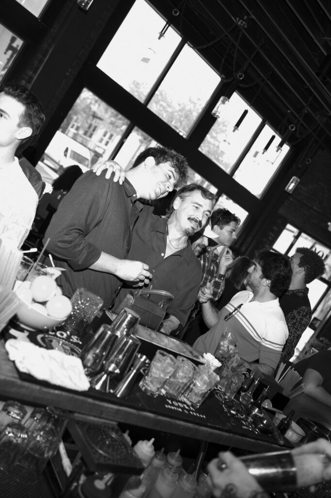 Family and friends celebrating an engagement in Downtown Jacksonville.