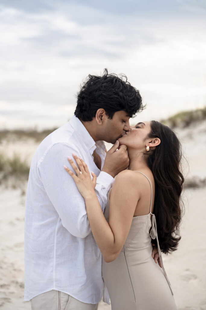 Romantic engagement portraits after a surprise proposal.