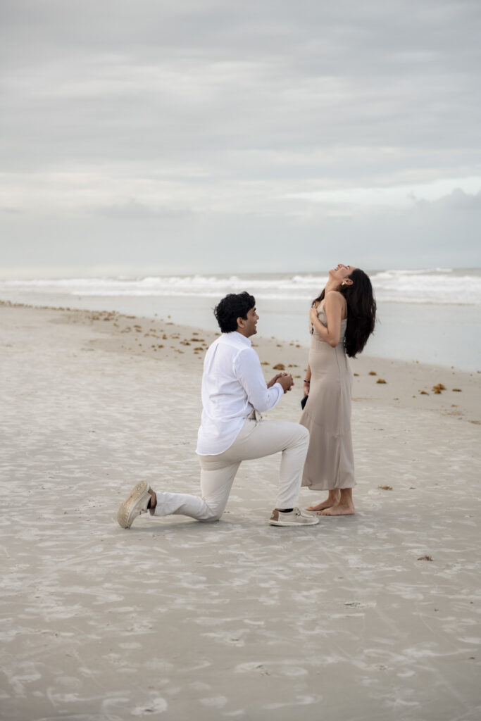 Emotional proposal moment captured on Crescent Beach.