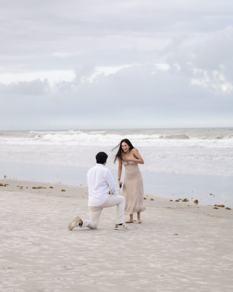 Surprise proposal setup at Crescent Beach with ocean views.