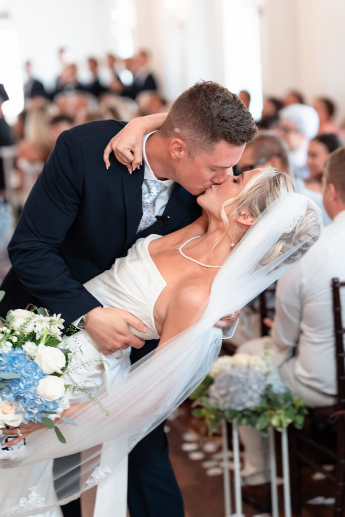Joyful first kiss after saying "I do."